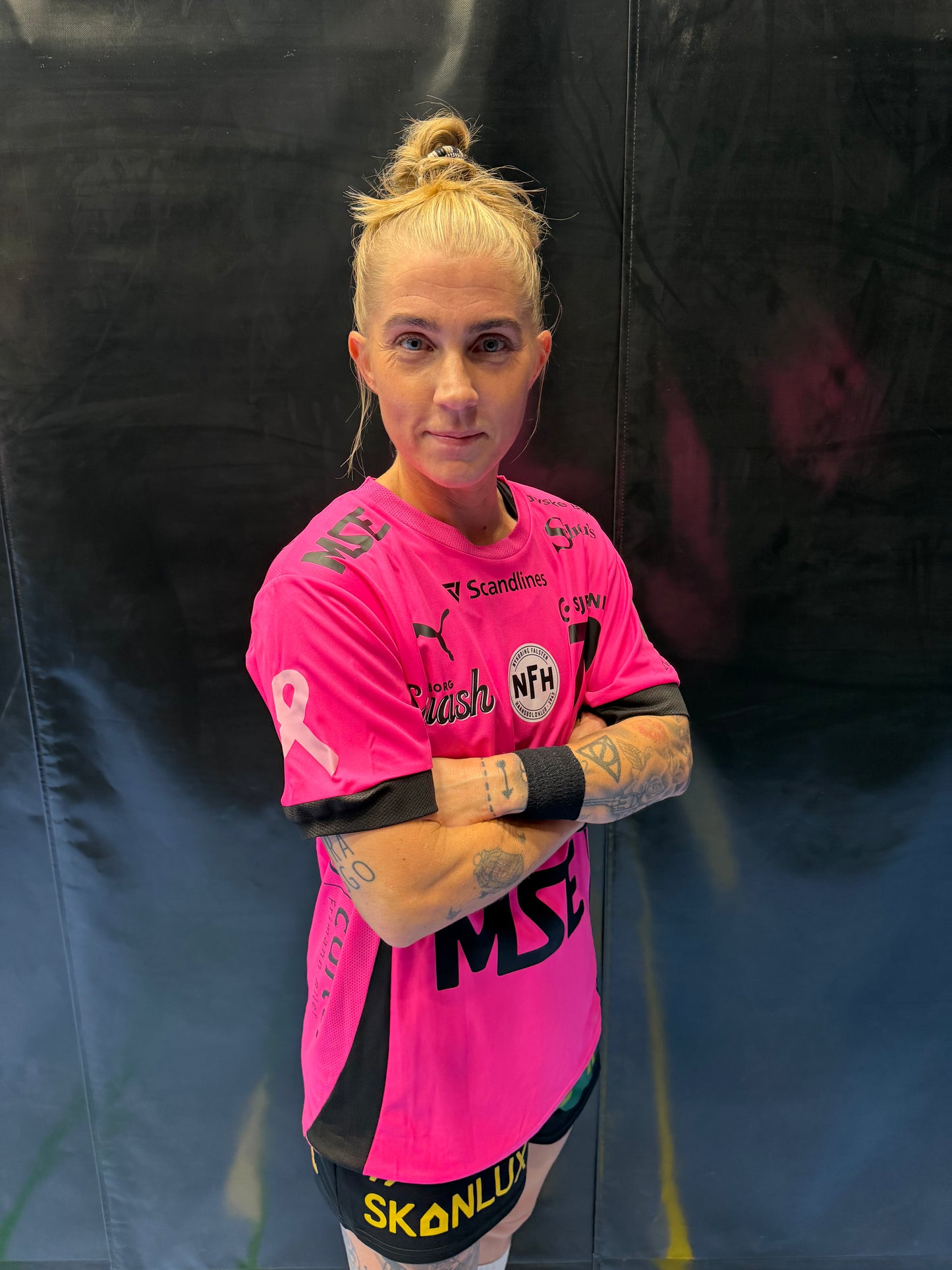 NFH's lyserøde Støt Brysterne-spillertrøje 2026 – #79 Kristina "Mulle" Kristiansen